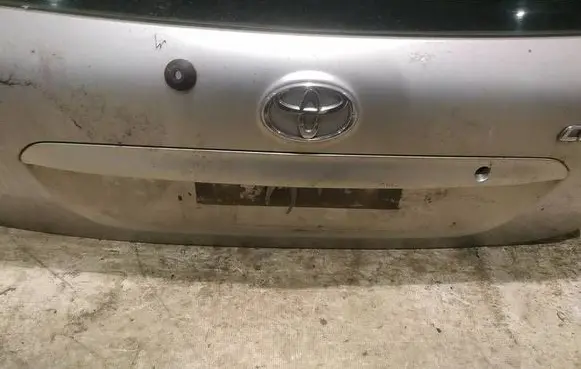 Toyota Corolla E120 E130 Trunk door license plate light bar 