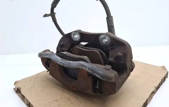 Opel Corsa F Front brake caliper 9824176580