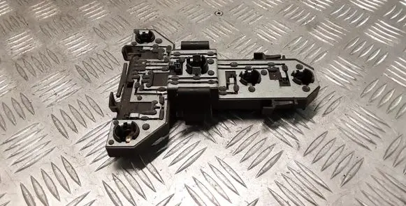 Tail light bulb cover holder