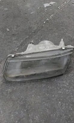 Mitsubishi Carisma Headlight/headlamp 14525900