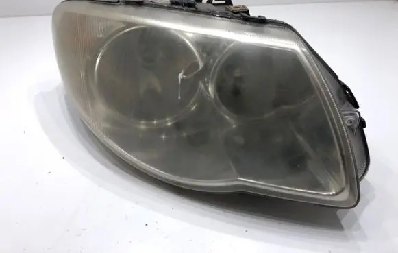 Chrysler Grand Voyager IV Headlight/headlamp 04857830AB