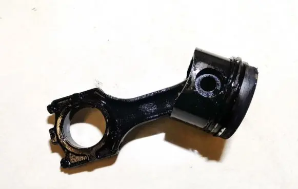 Opel Omega B1 Piston with connecting rod 989
