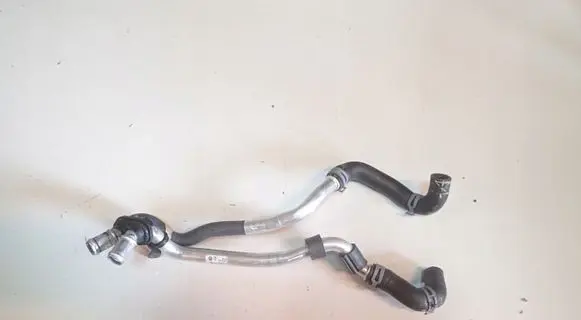 Volkswagen Touareg II Engine coolant pipe/hose 7P0819911E