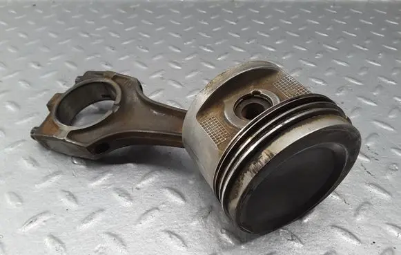 Piston with connecting rod