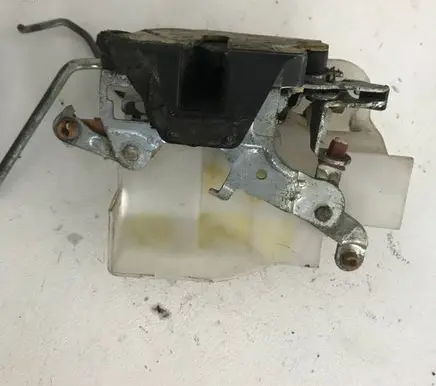 Mazda 323 F Front door lock 1212123