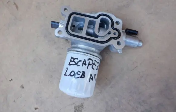 Ford Escape IV Oil filter mounting bracket K2GE6881AC
