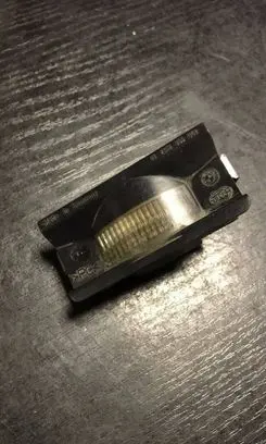 BMW 5 E34 Number plate light 8355048