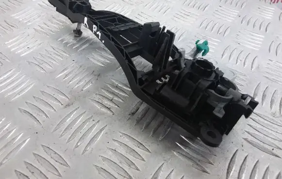Opel Zafira B Front door exterior handle/bracket 24463524