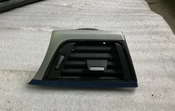 Dash center air vent grill