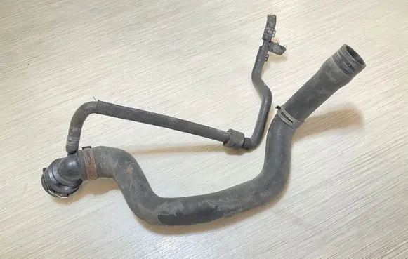 Volkswagen Touran I Engine coolant pipe/hose 1K0122101AC
