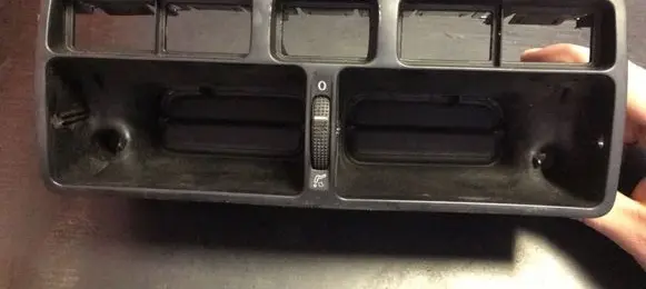 Volkswagen Golf IV Dash center air vent grill 1J0819728C