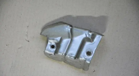 Volkswagen Scirocco Heat shield in engine bay 04L129969J