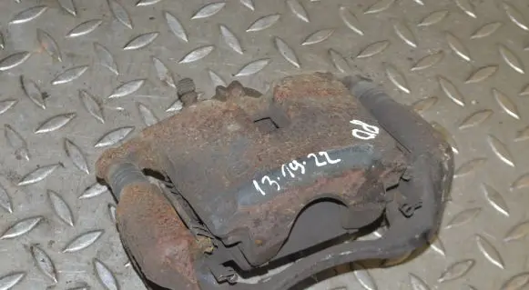 Mazda 3 II Front brake caliper