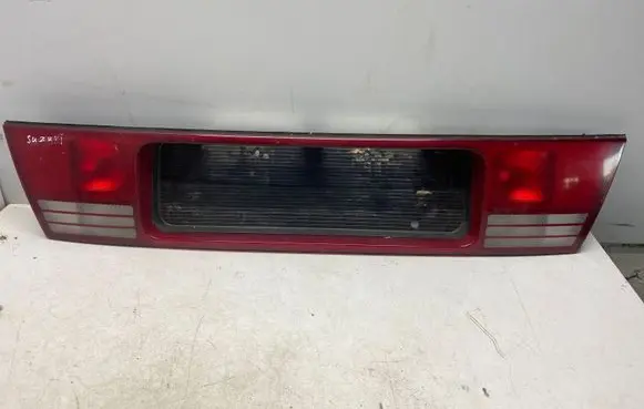 Trunk door license plate light bar