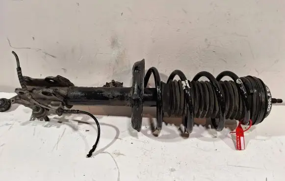 Opel Corsa D Front shock absorber/damper 13343100