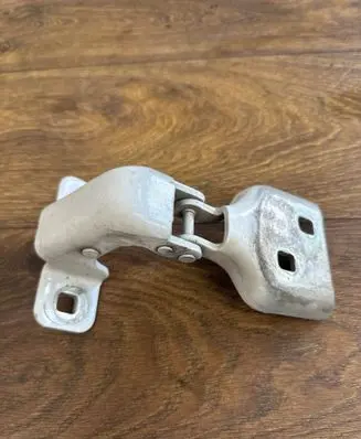 Front door lower hinge