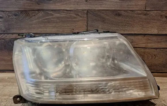 Suzuki Grand Vitara II Headlight/headlamp 10059079