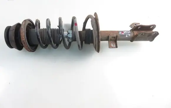 Suzuki Swift I Front shock absorber with coil spring SG333409