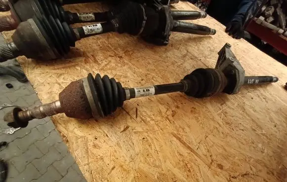 Opel Astra J Front driveshaft 13271556