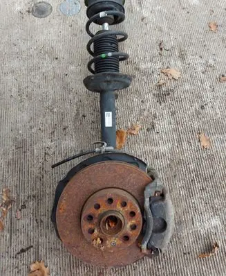 Volkswagen Golf VII Front shock absorber with coil spring 5Q0413023GR