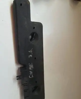 Tail light bulb cover holder