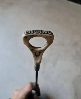 Oil level dip stick