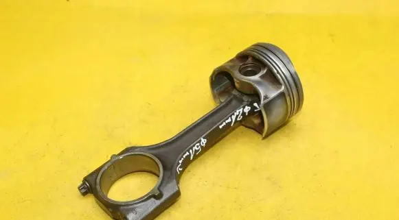 Piston with connecting rod