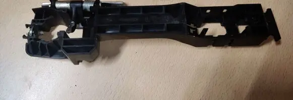 Rear door exterior handle/bracket