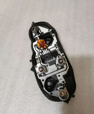 Opel Corsa D Tail light bulb cover holder 89037853