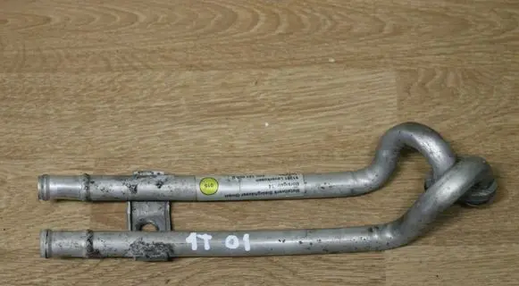 Volkswagen Touran I Engine oil radiator 03C121050B
