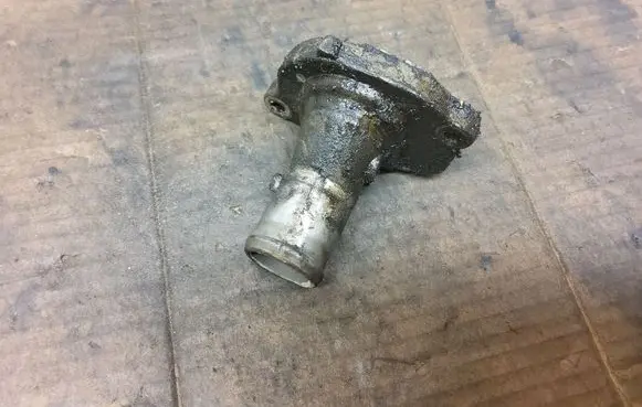 Thermostat/thermostat housing