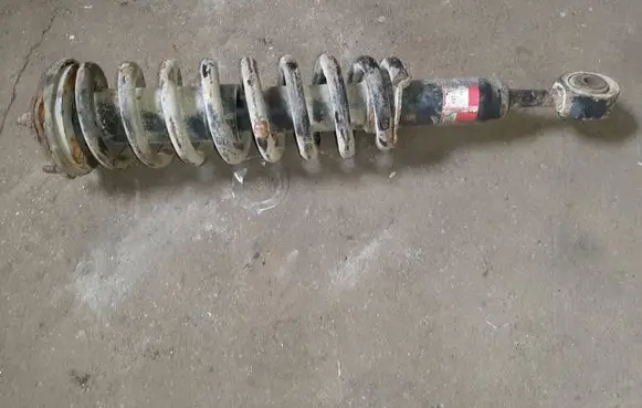 Toyota Land Cruiser (J200) Front shock absorber with coil spring