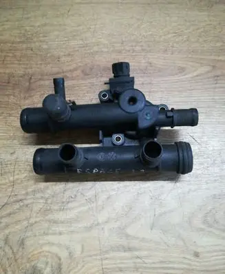 Thermostat/thermostat housing