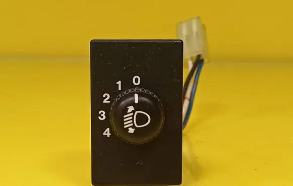 Suzuki Swift I Headlight level height control switch