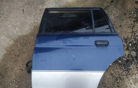 Mitsubishi Pajero Sport I Rear door melynos