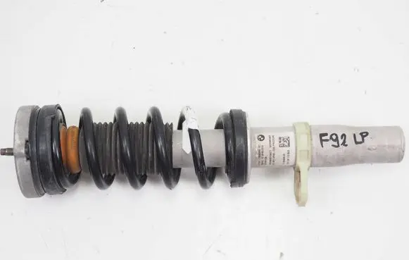 Front shock absorber with coil spring