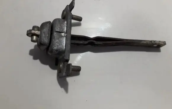 Rear door check strap stopper