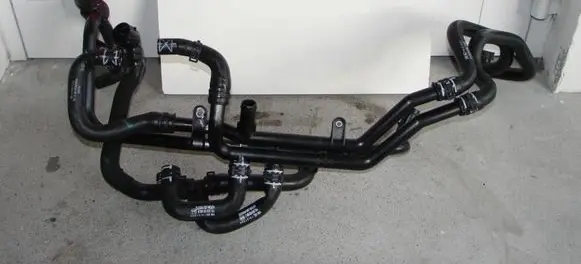 Volkswagen Jetta VI Engine coolant pipe/hose 04E121070J
