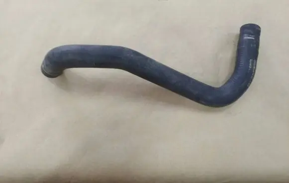 Volkswagen Golf VII Engine coolant pipe/hose 5Q0121058AE
