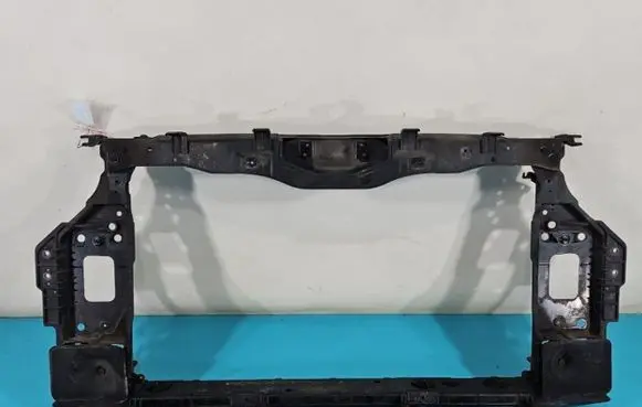 Radiator support slam panel