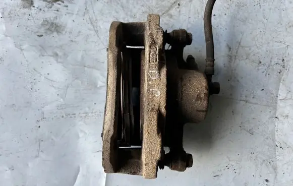 Opel Frontera B Front brake caliper