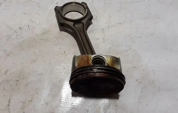 Piston with connecting rod