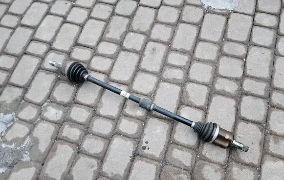 Opel Corsa E Front driveshaft AA7J 0991114