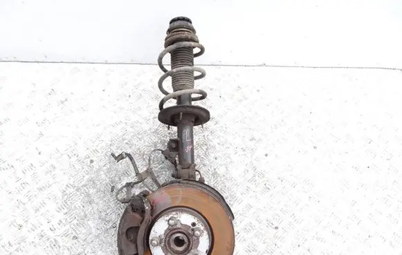 Front wheel hub spindle knuckle