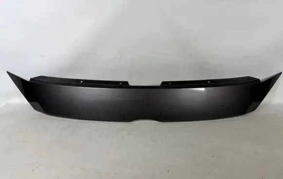 Rear bumper trim bar molding