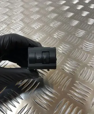 Headlight level height control switch