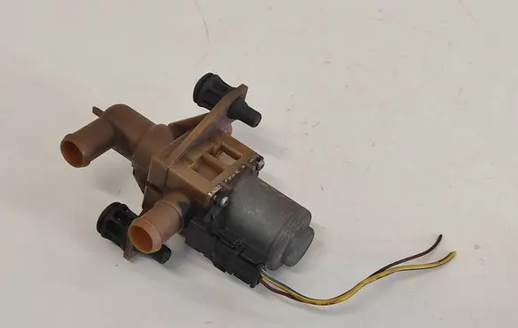 Coolant heater control valve