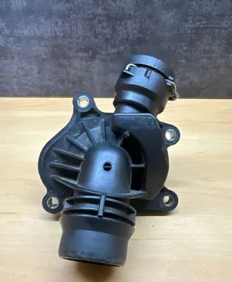 Thermostat/thermostat housing