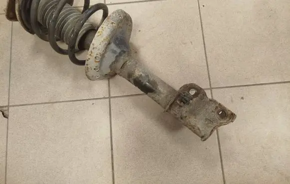 Subaru B9 Tribeca Front shock absorber with coil spring 
