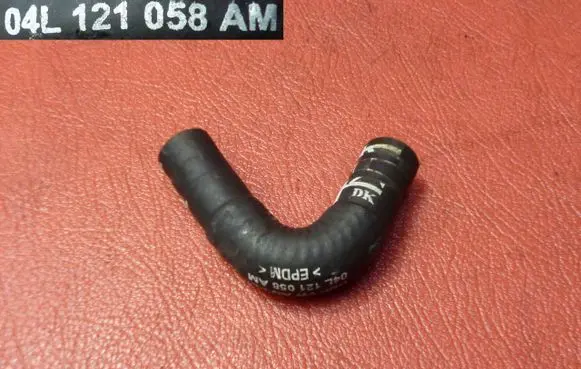 Audi A1 Engine coolant pipe/hose 04L121058AM